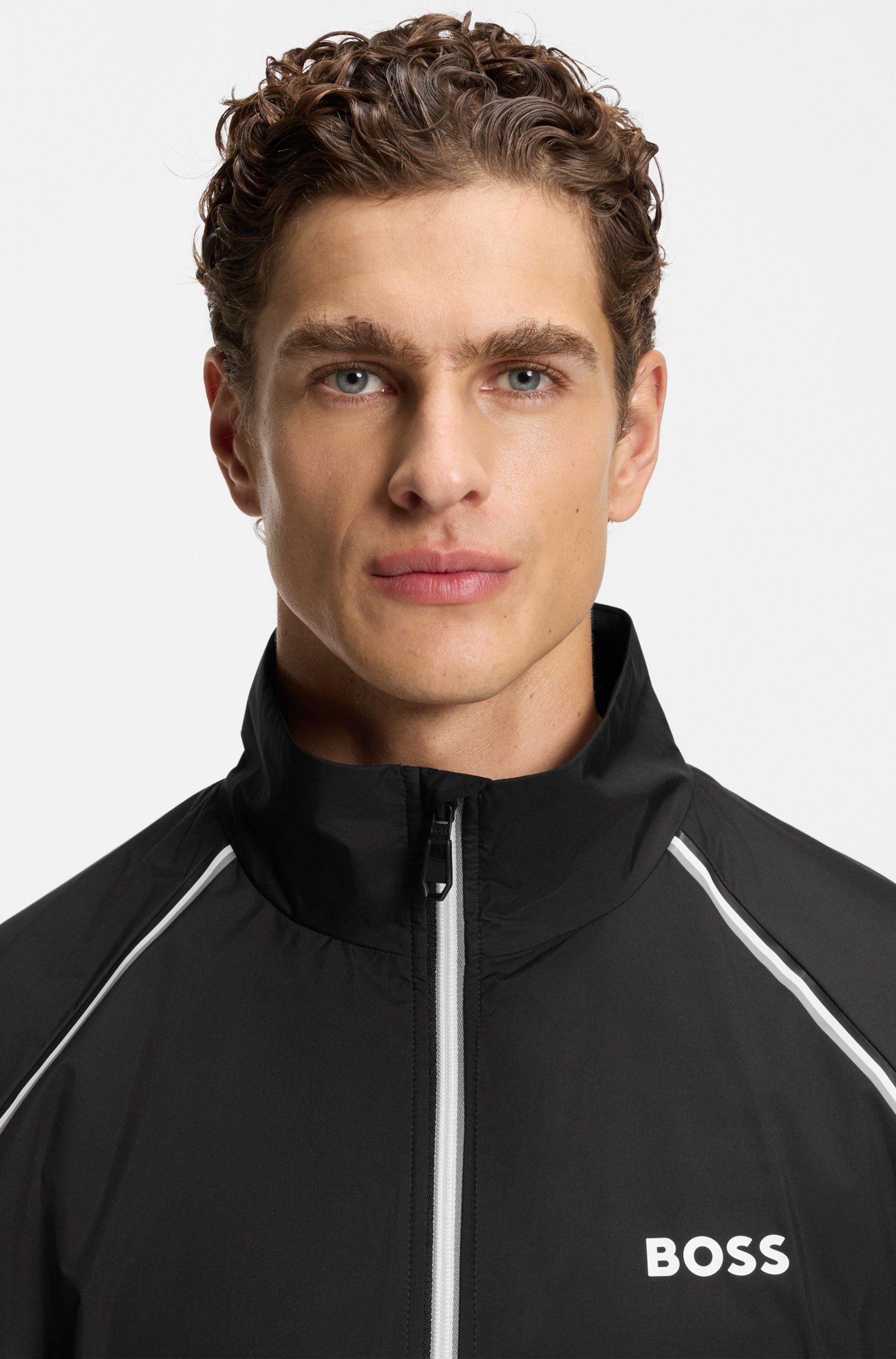 BOSS - Bộ tracksuit thể thao chống nước, gấu quần kéo khóa