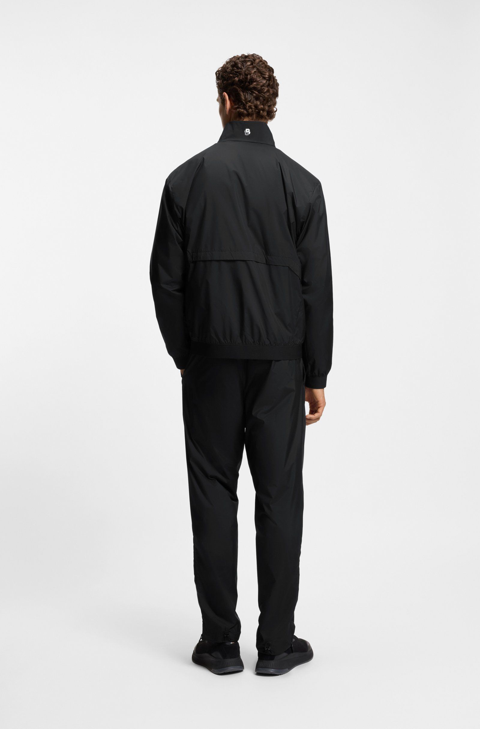 BOSS - Bộ tracksuit thể thao chống nước, gấu quần kéo khóa