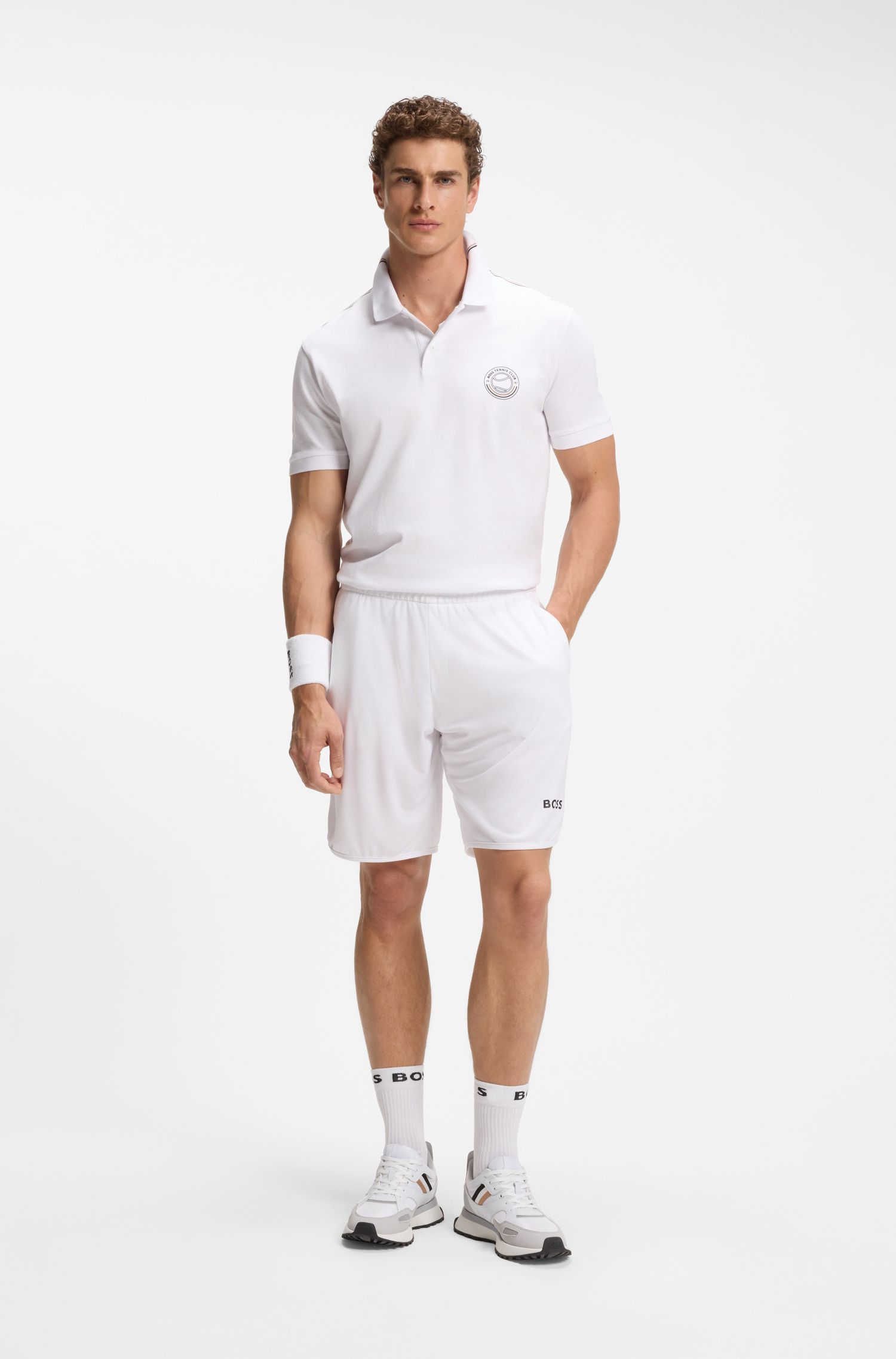 BOSS - Áo polo bằng vải cotton co giãn với logo lấy cảm hứng từ môn tennis