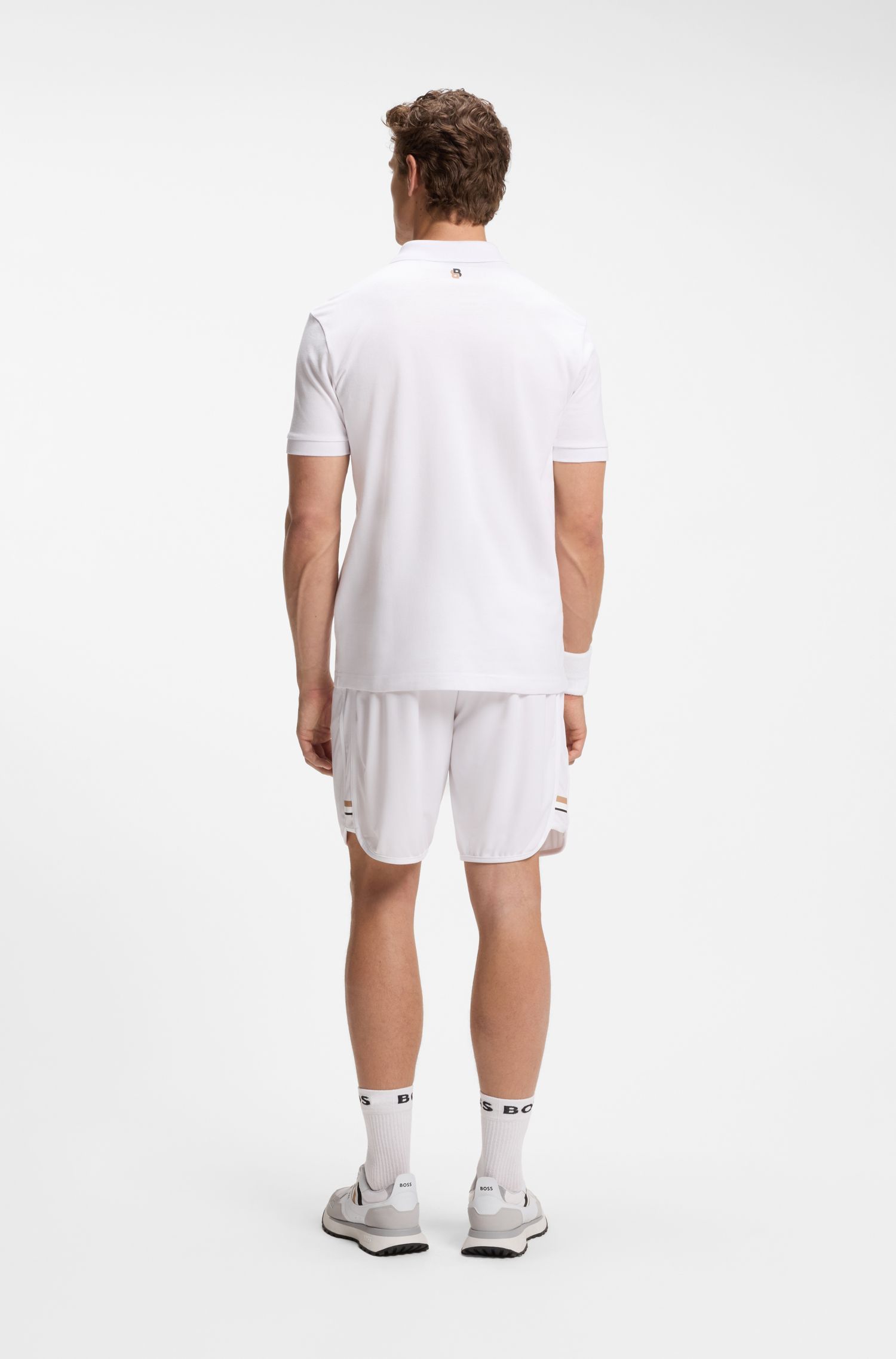 Áo polo bằng vải cotton co giãn với logo lấy cảm hứng từ môn tennis