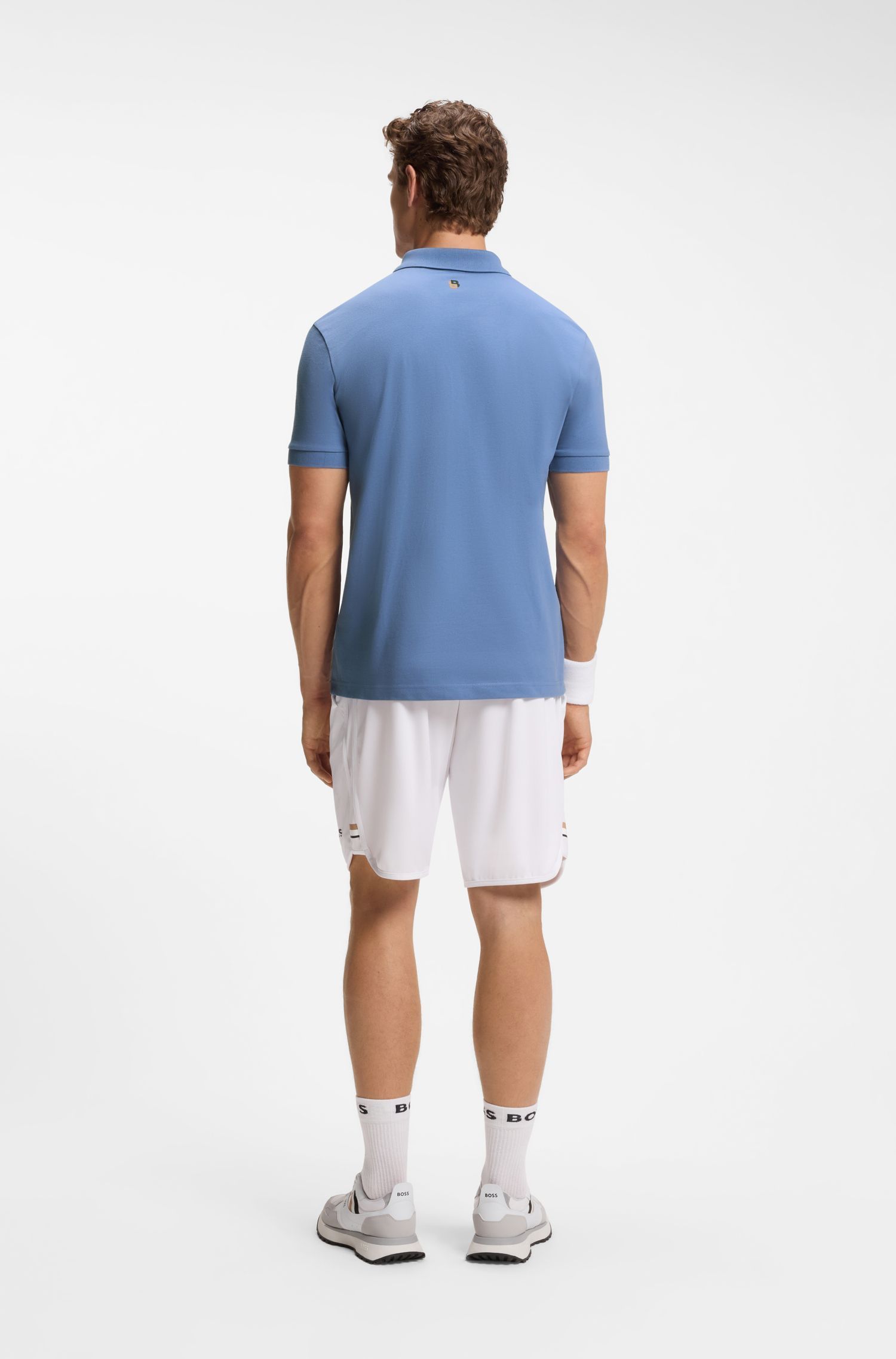 Áo polo bằng vải cotton co giãn với logo lấy cảm hứng từ môn tennis