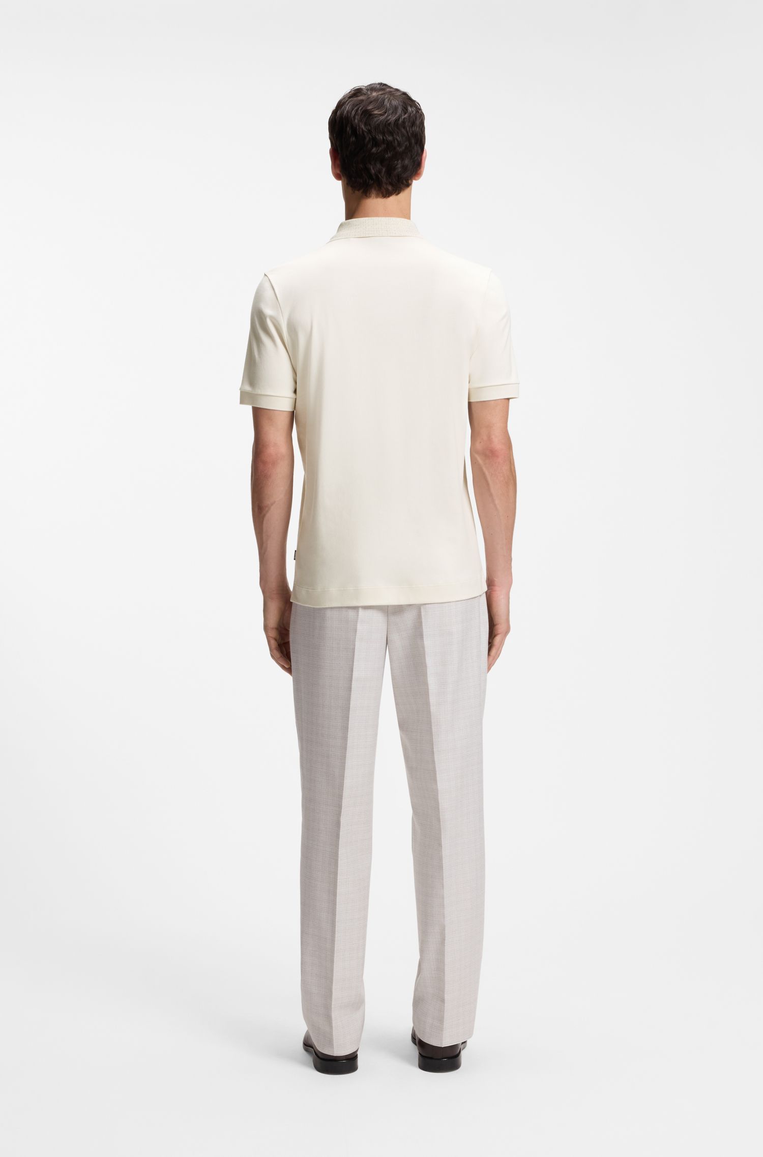 Áo polo cotton dáng regular fit với cổ áo họa tiết