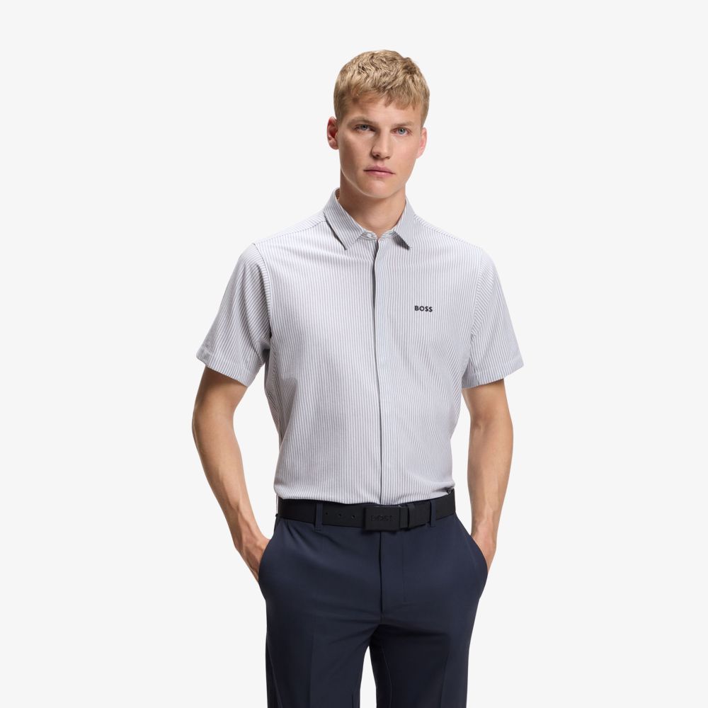 Áo sơ mi dáng regular fit làm từ vải cotton piqué.