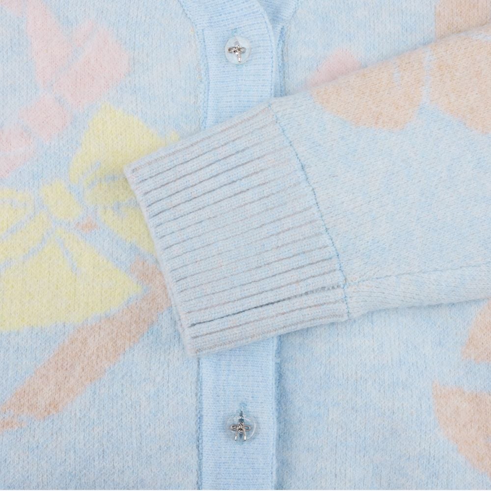 Áo cardigan gió jacquard họa tiết nơ Xanh dương