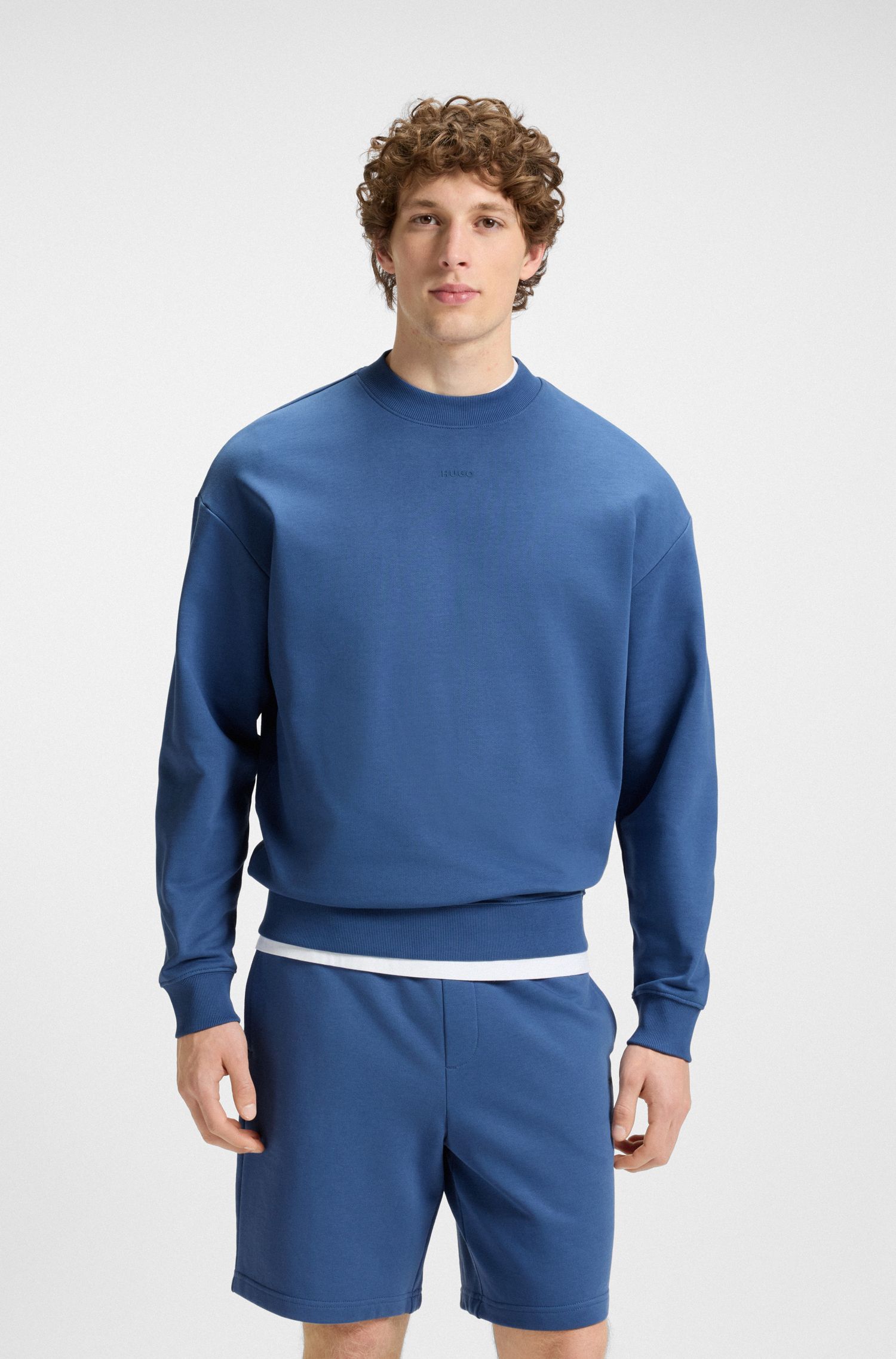 Áo sweatshirt dáng relaxed vải terry cotton với logo trên tay áo