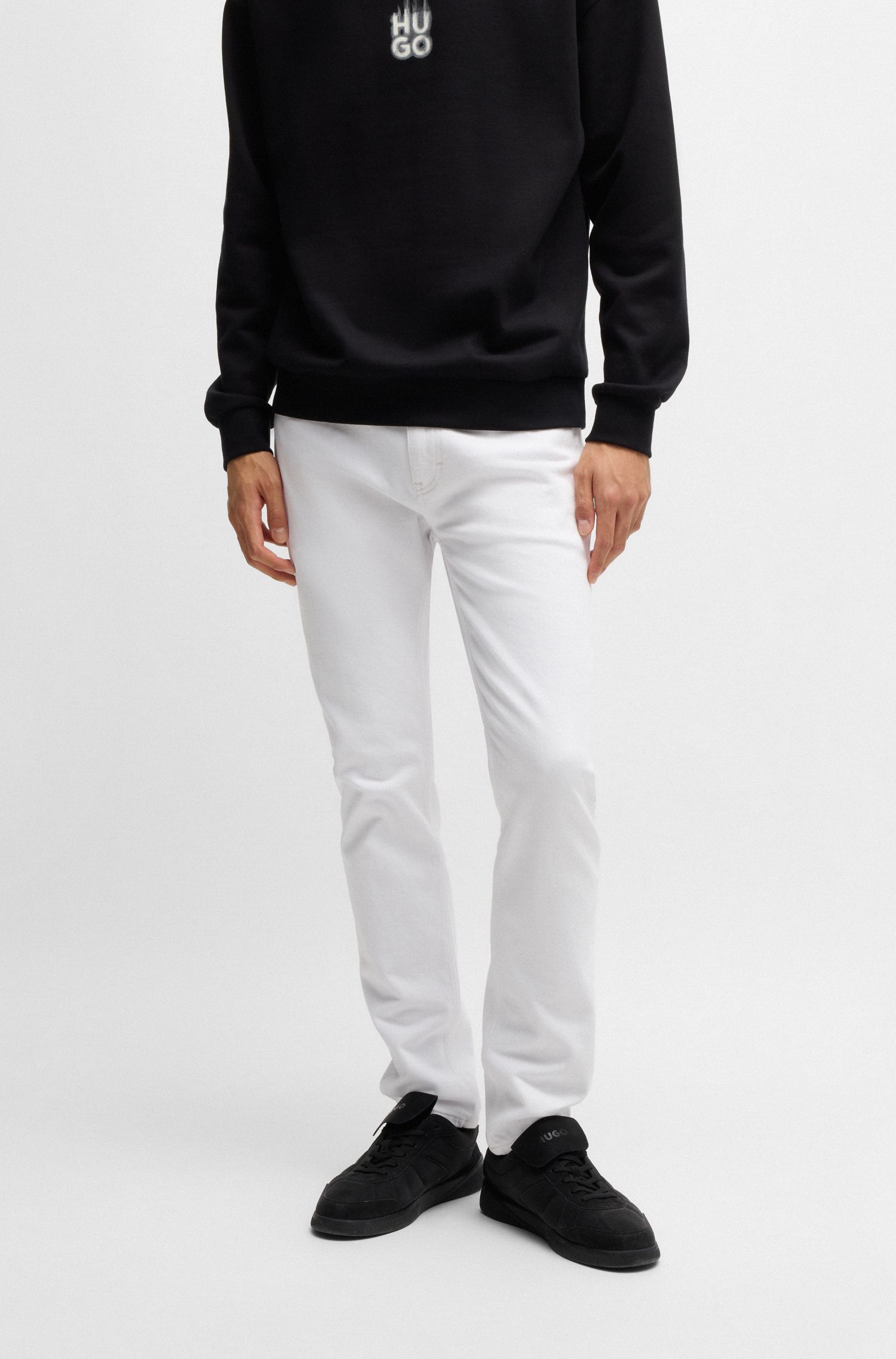Quần jeans dáng slim fit vải denim trắng co giãn
