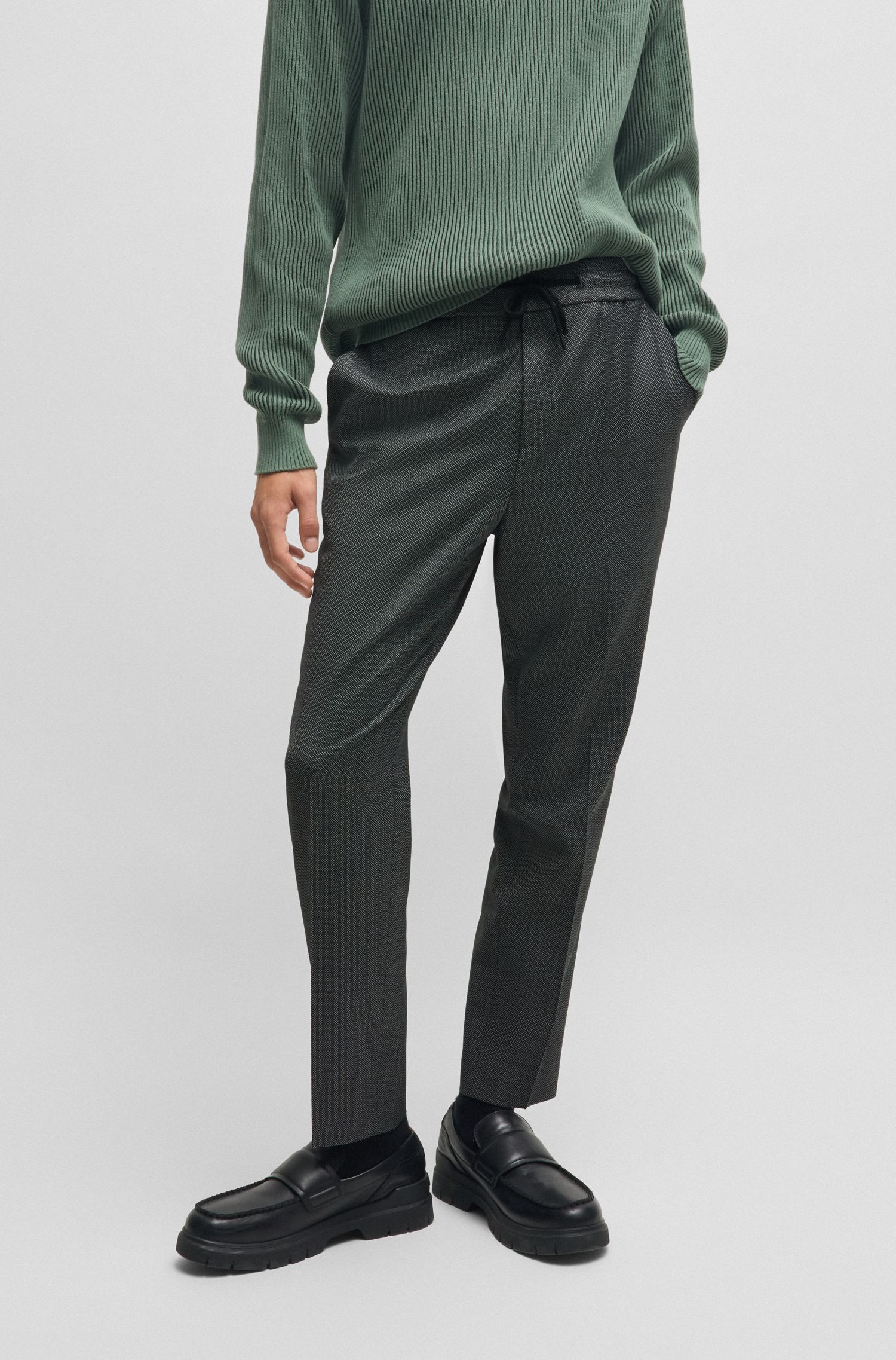 Quần dài dáng extra-slim-fit vải co giãn có họa tiết