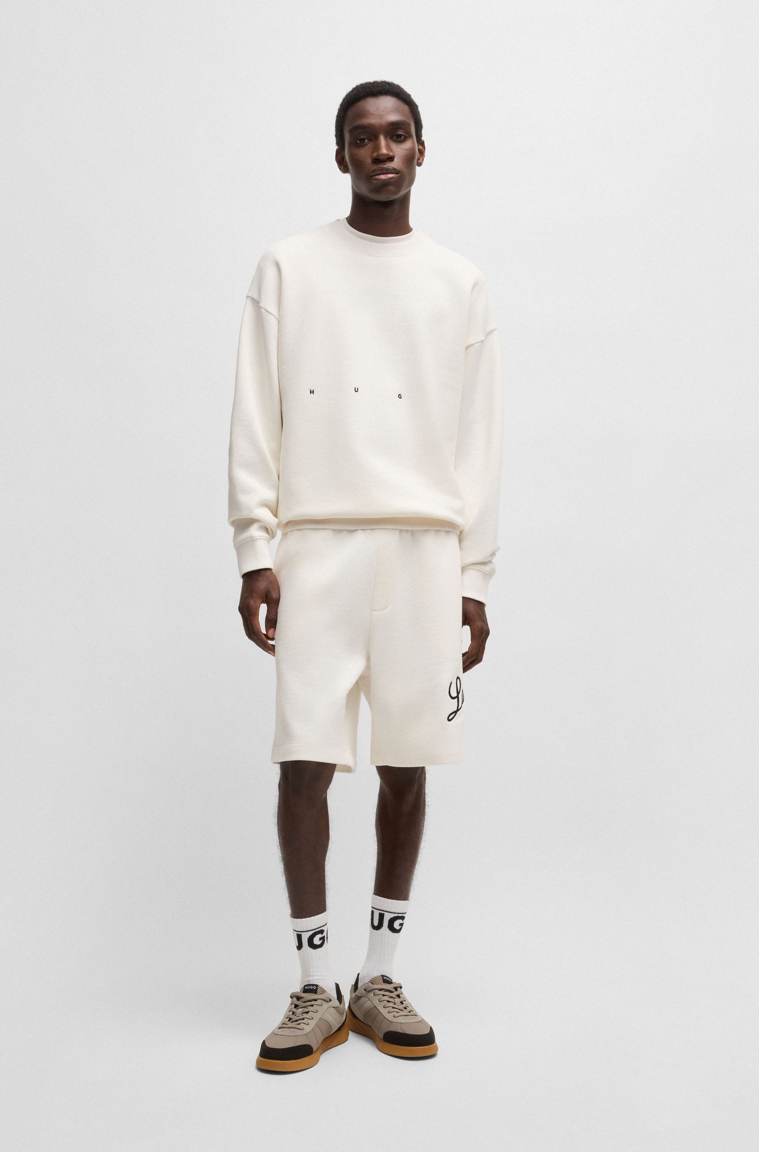 HUGO - Quần short terry cotton in logo artwork