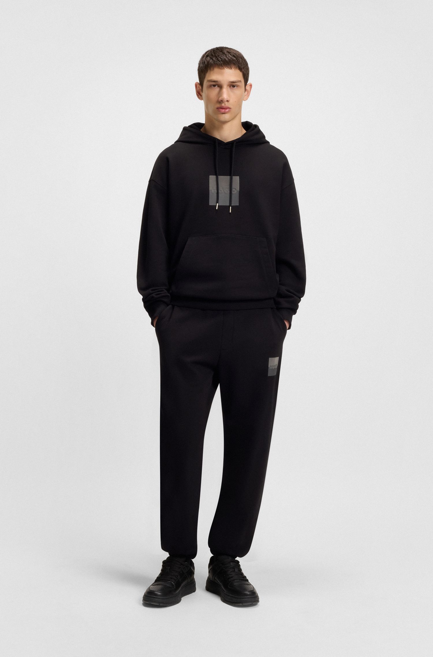 HUGO - Quần jogger dáng relaxed fit vải cotton terry họa tiết logo tách