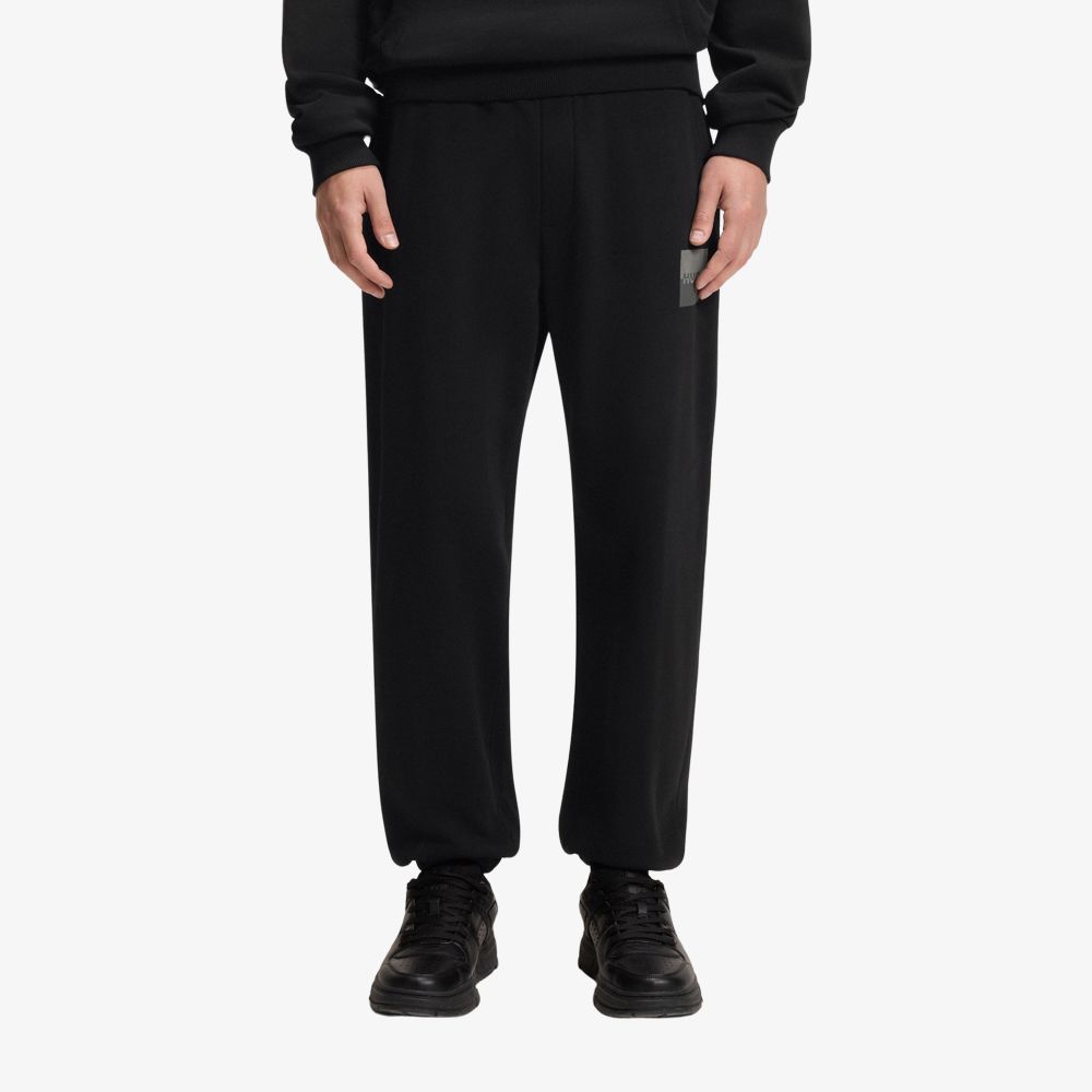 Quần jogger dáng relaxed fit vải cotton terry họa tiết logo tách