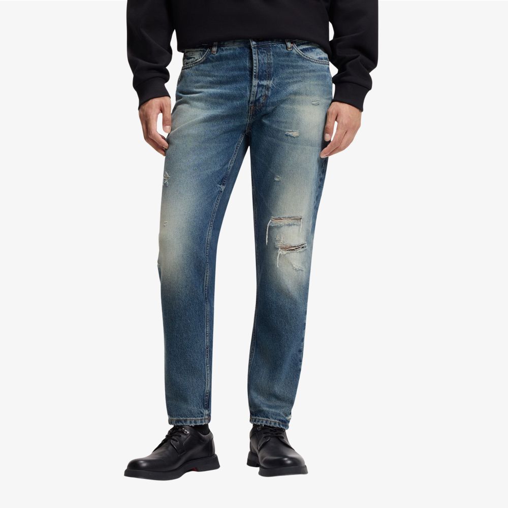 Quần jeans dáng tapered-fit denim xanh hiệu ứng sờn rách và bạc màu