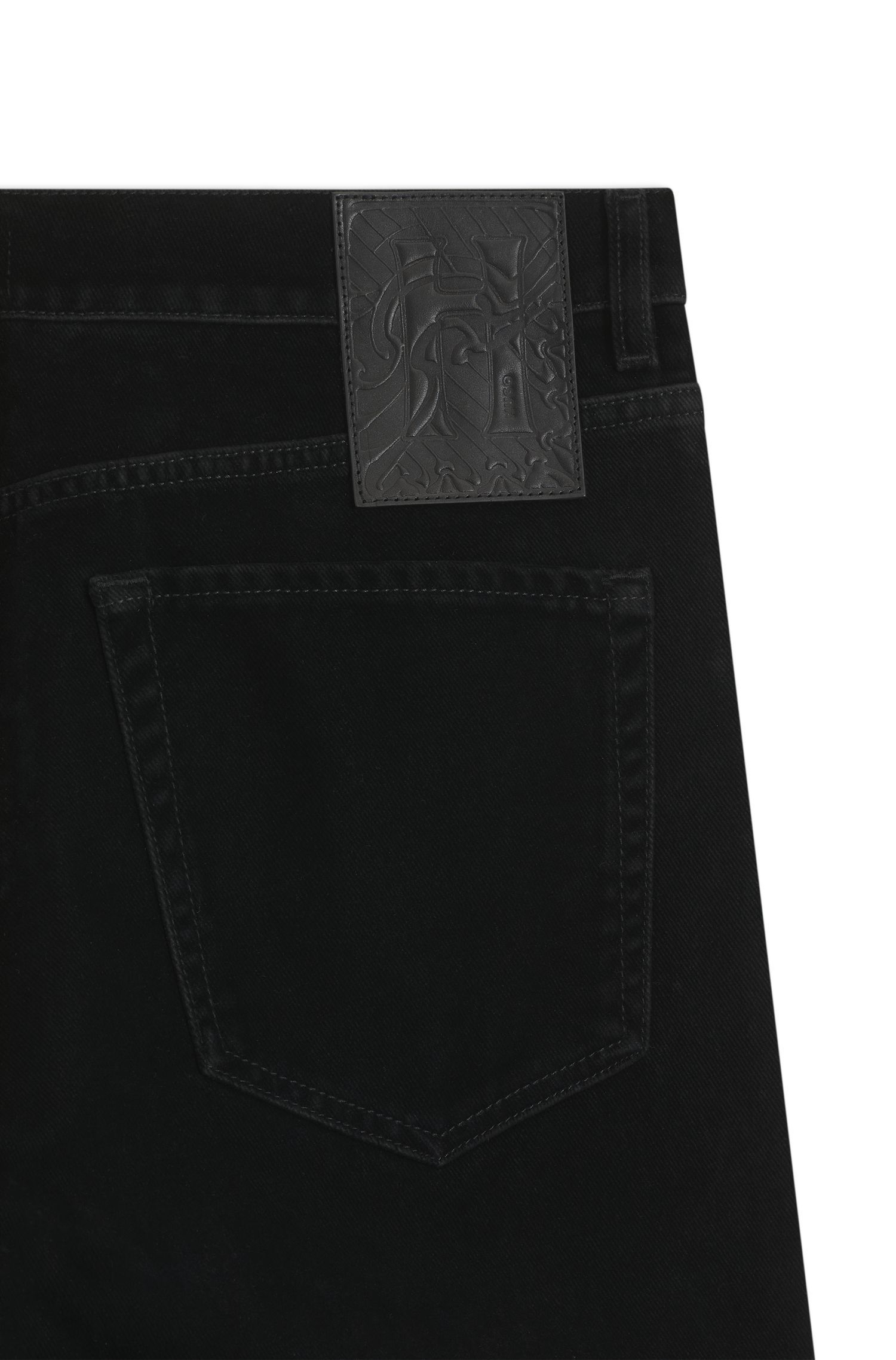 Quần jeans tapered fit chất liệu cotton velvet
