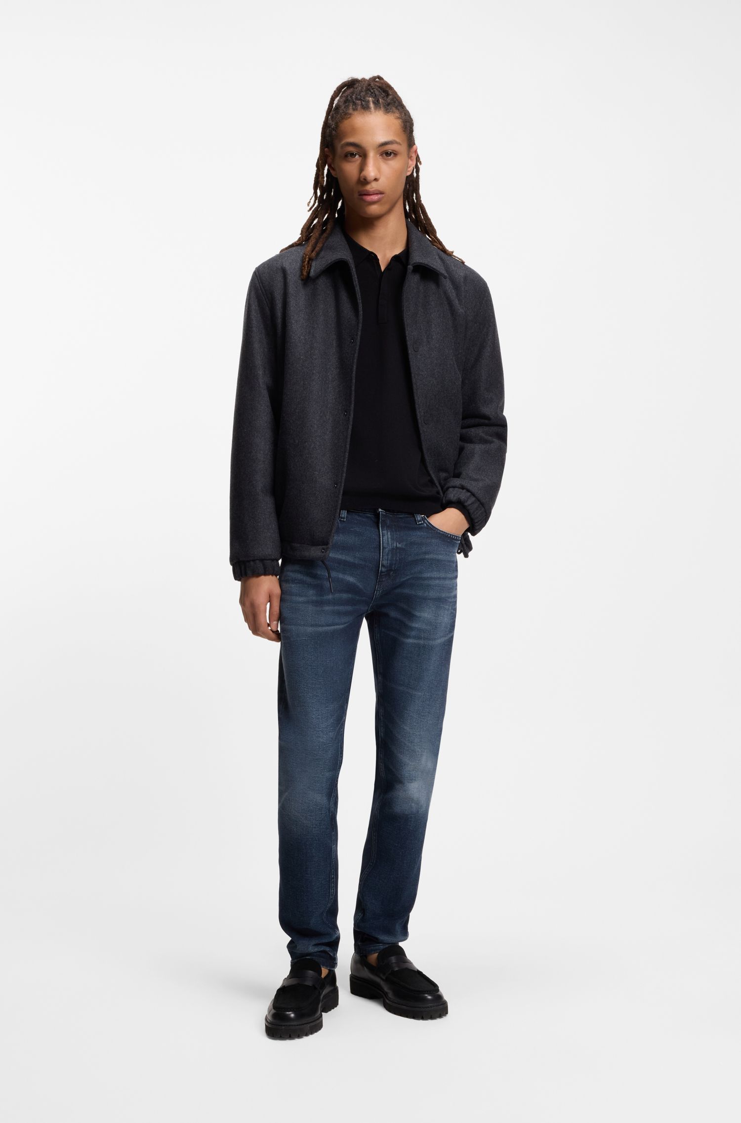 HUGO - Quần jeans dáng ôm sát màu xanh đậm, chất liệu denim co giãn.
