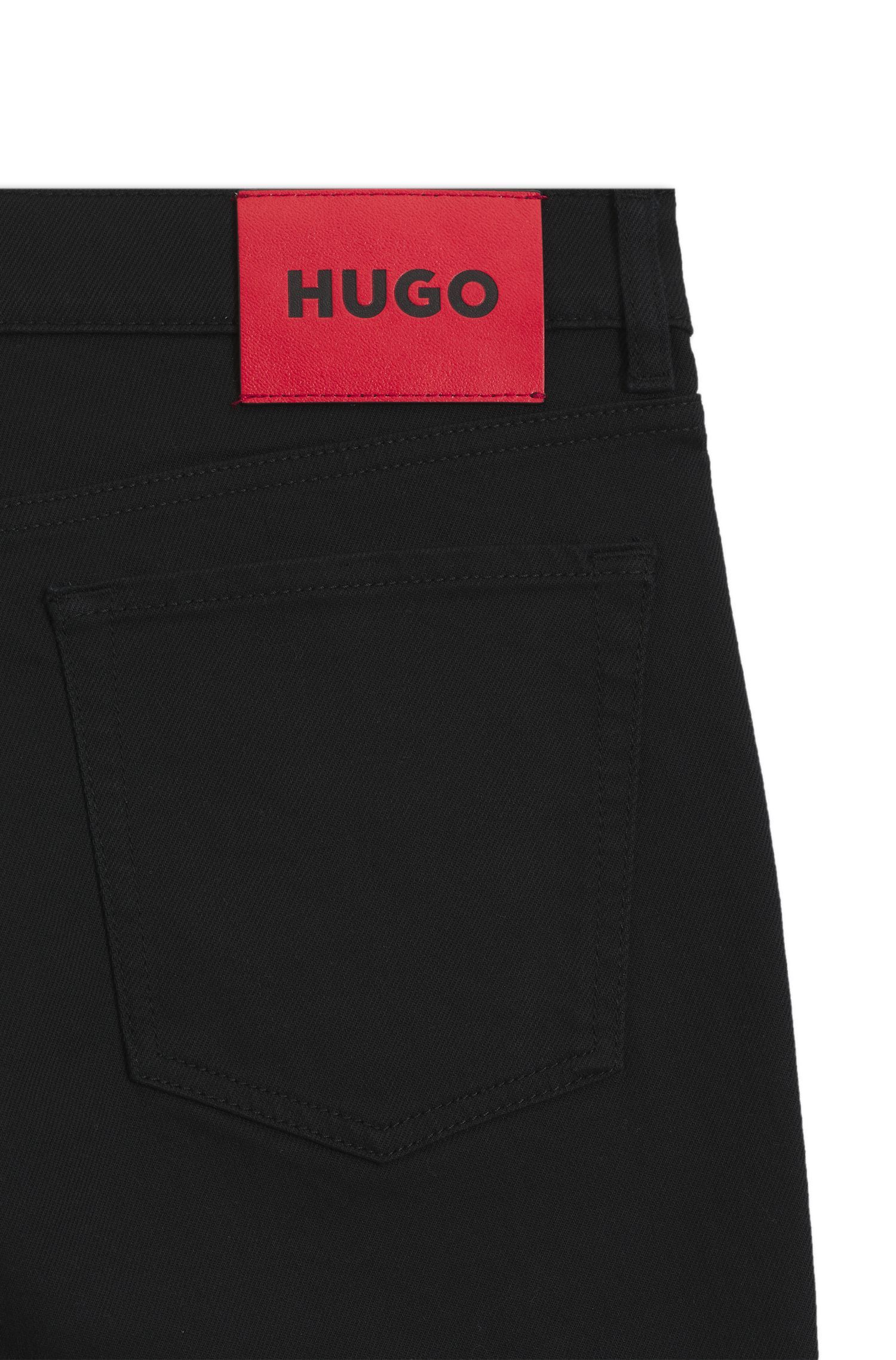 HUGO - Quần jeans tapered fit màu đen chất liệu denim điều hòa nhiệt độ