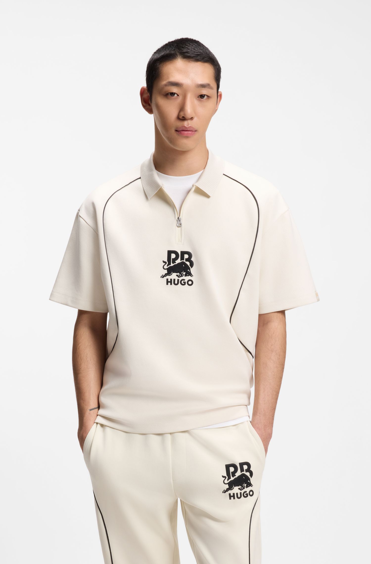Áo polo Hugo x RB với họa tiết bò tót