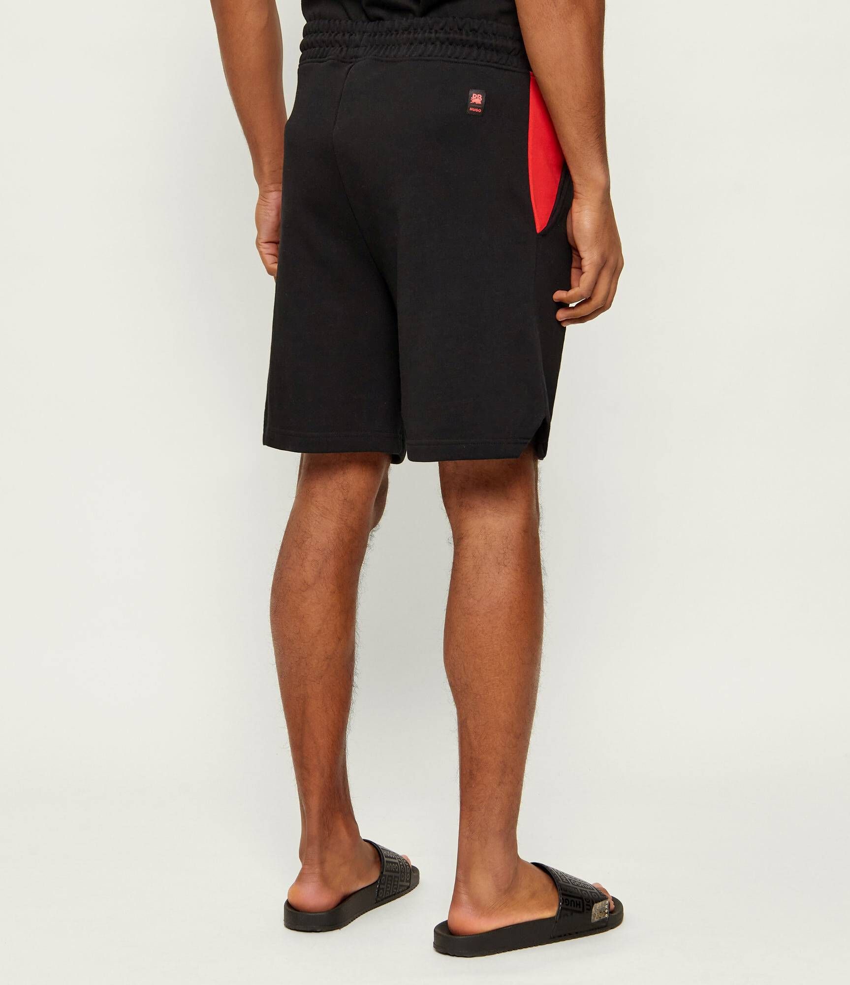 HUGO - Quần short cotton terry Hugo x RB với họa tiết bò tót