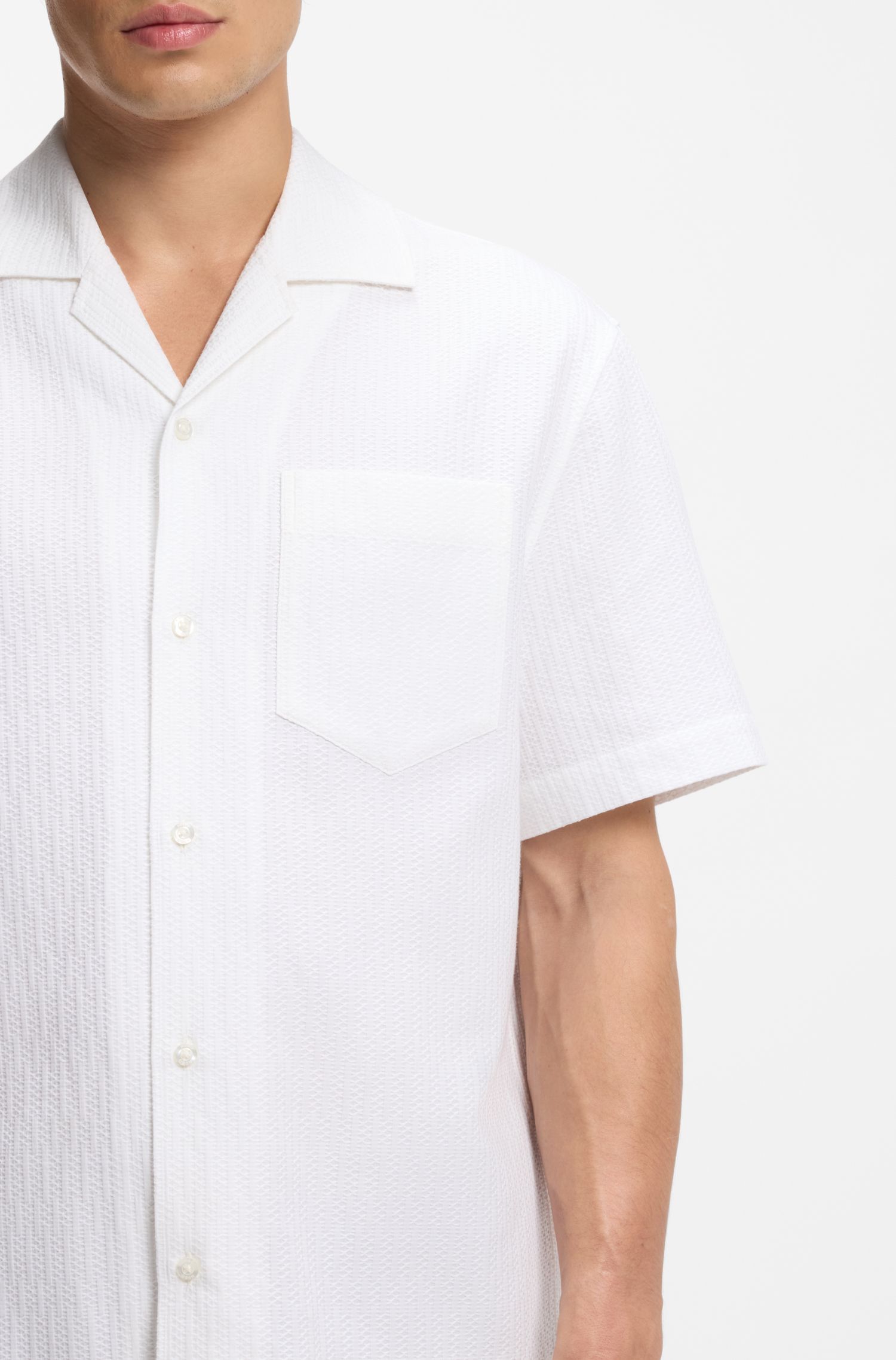 HUGO - Áo sơ mi dáng rộng làm từ chất liệu cotton cứng cáp.