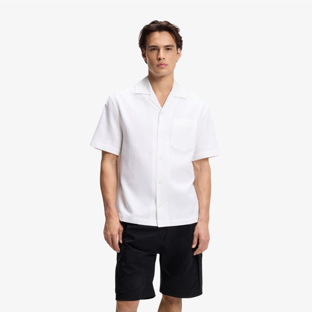 HUGO - Áo sơ mi dáng rộng làm từ chất liệu cotton cứng cáp.