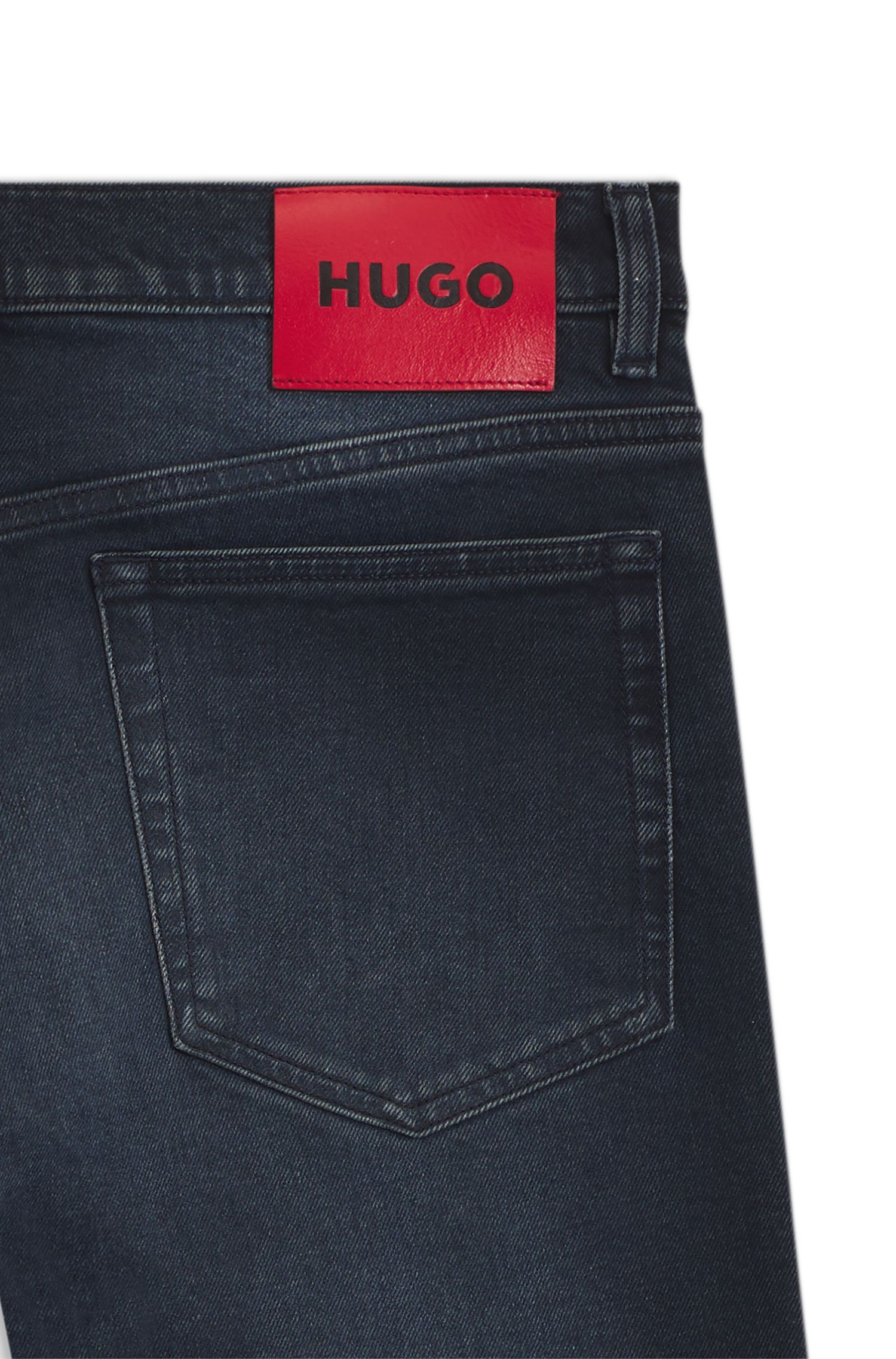 HUGO - Quần jeans dáng ôm màu xanh đậm, chất liệu denim co giãn.