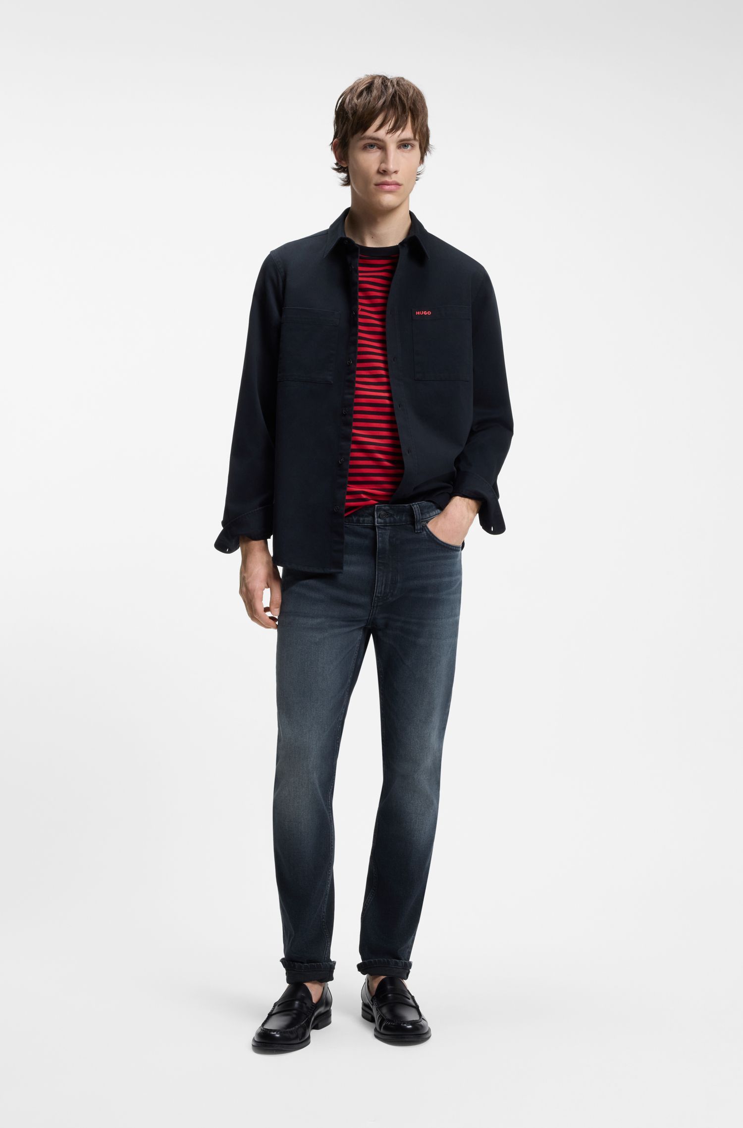HUGO - Quần jeans dáng ôm màu xanh đậm, chất liệu denim co giãn.
