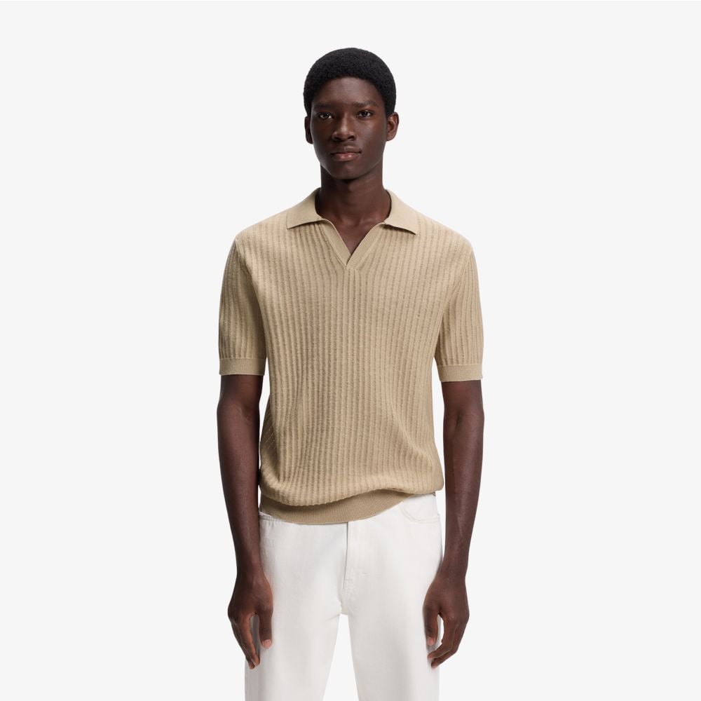 Áo polo cổ bẻ dệt kim bằng vải jacquard cotton-linen.
