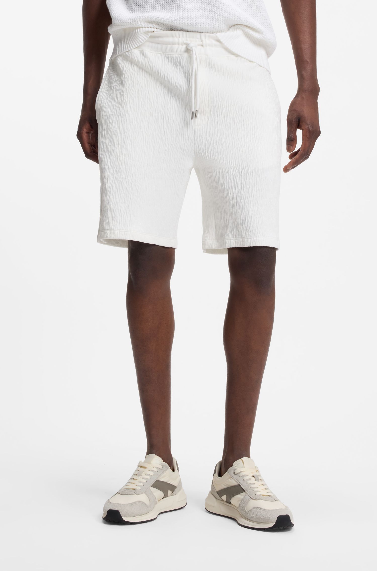 HUGO - Quần short cotton co giãn với hiệu ứng nhăn.