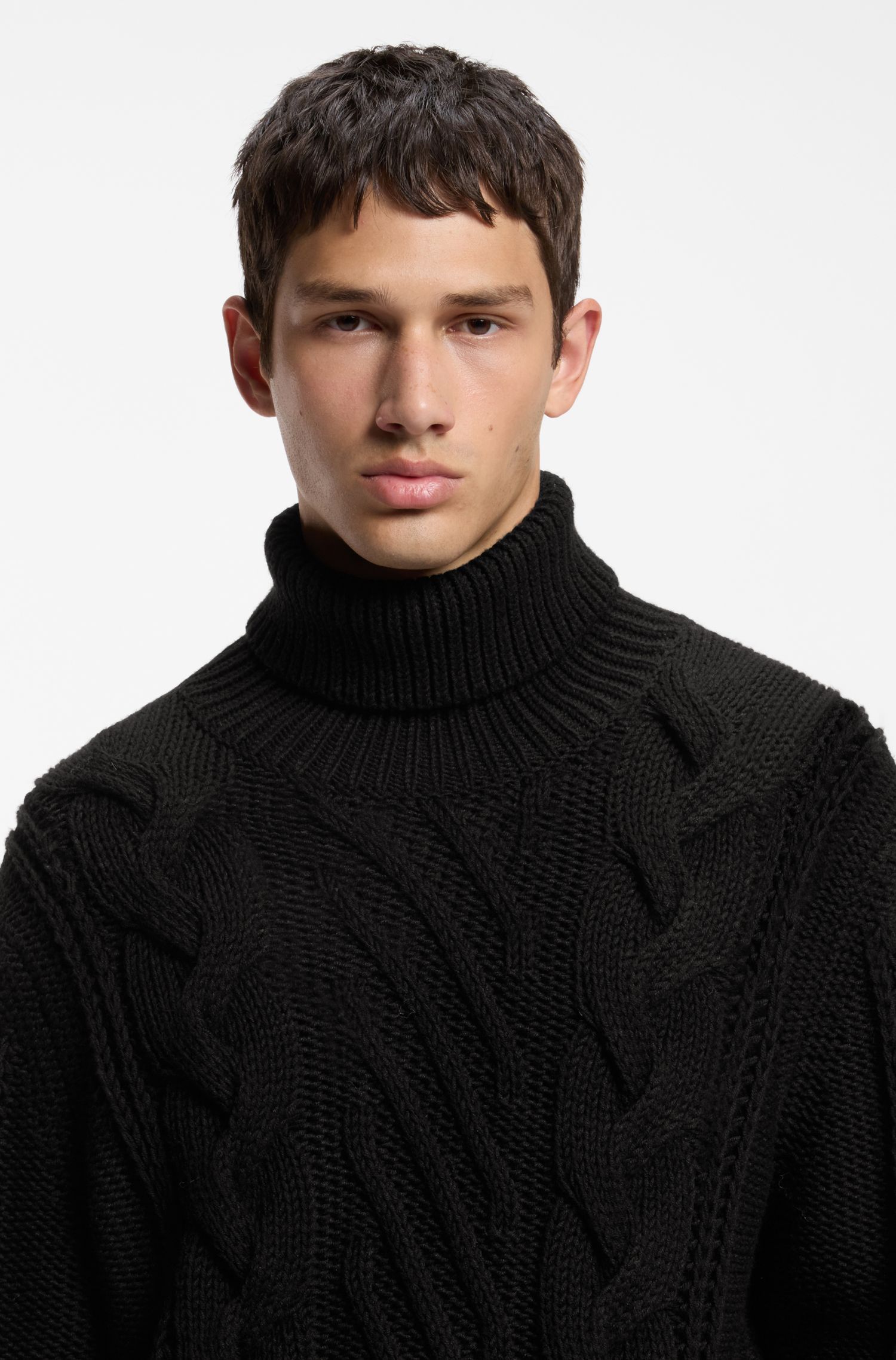 Áo len cổ lọ oversize dệt cáp