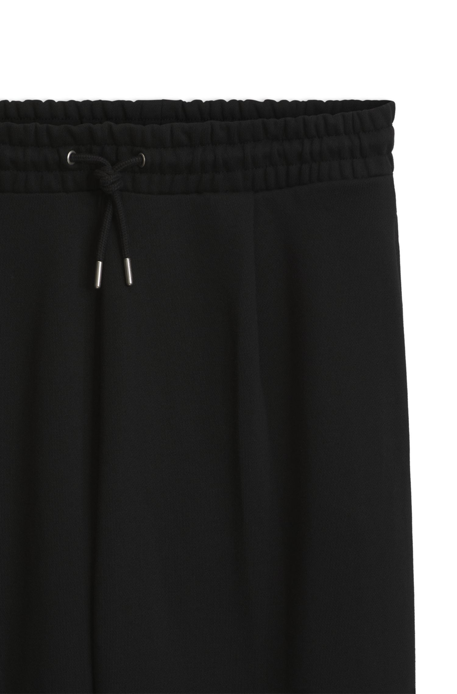 Quần thể thao relaxed fit vải cotton terry