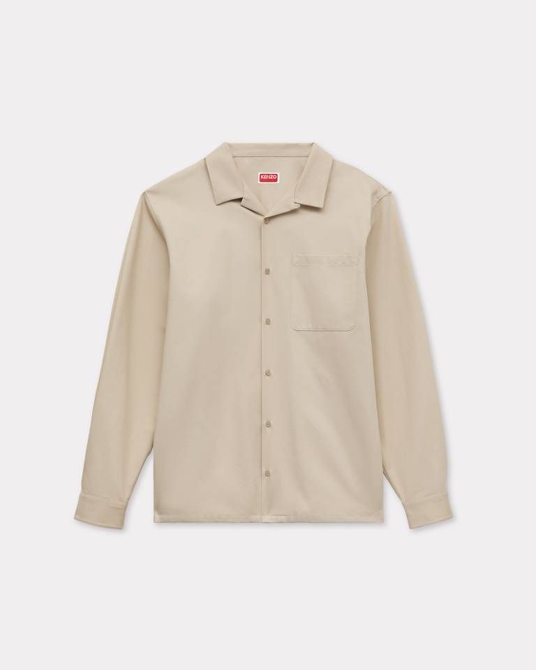 Áo sơ mi dáng rộng đặc trưng của KENZO, chất liệu cotton họa tiết xương cá.
