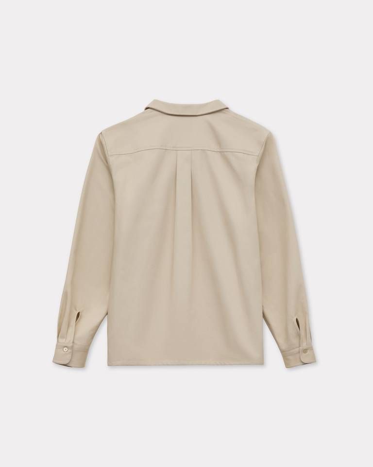Áo sơ mi dáng rộng đặc trưng của KENZO, chất liệu cotton họa tiết xương cá.