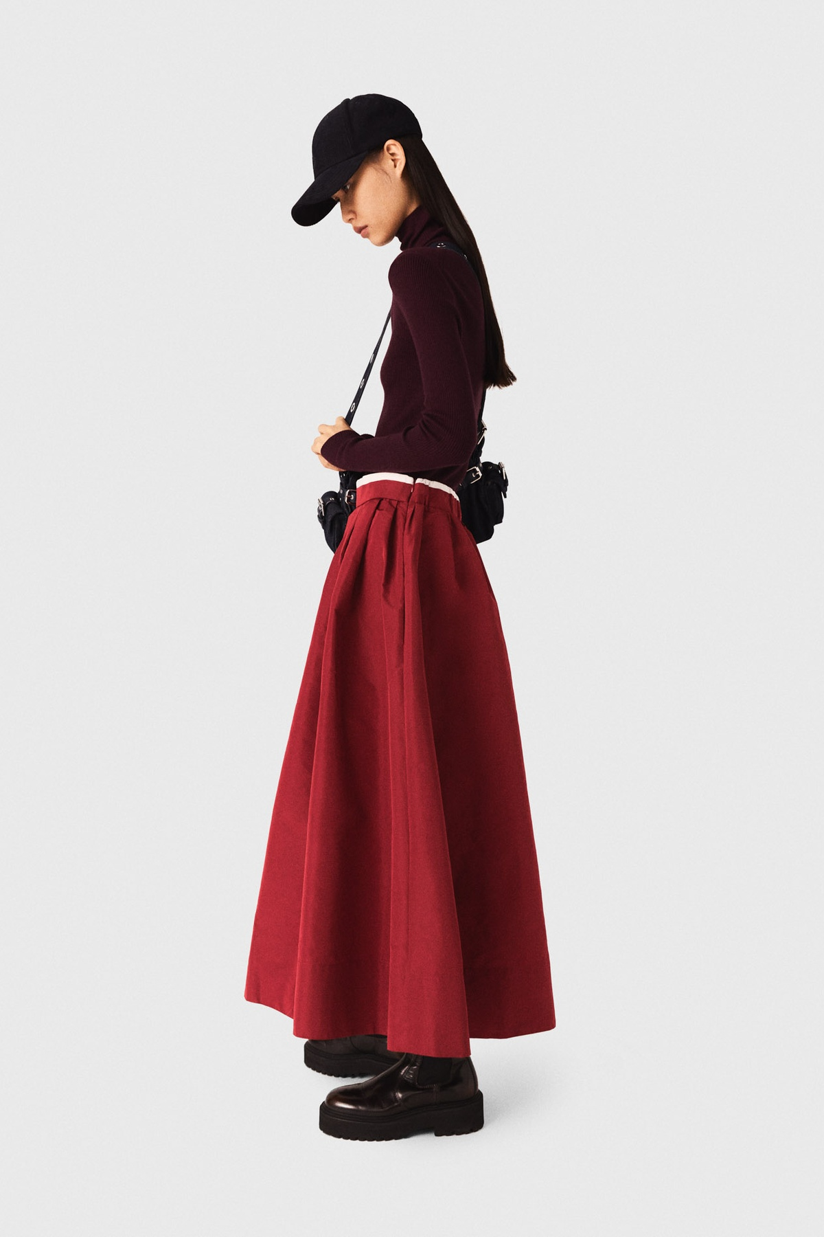 Chân váy midi xếp ly
