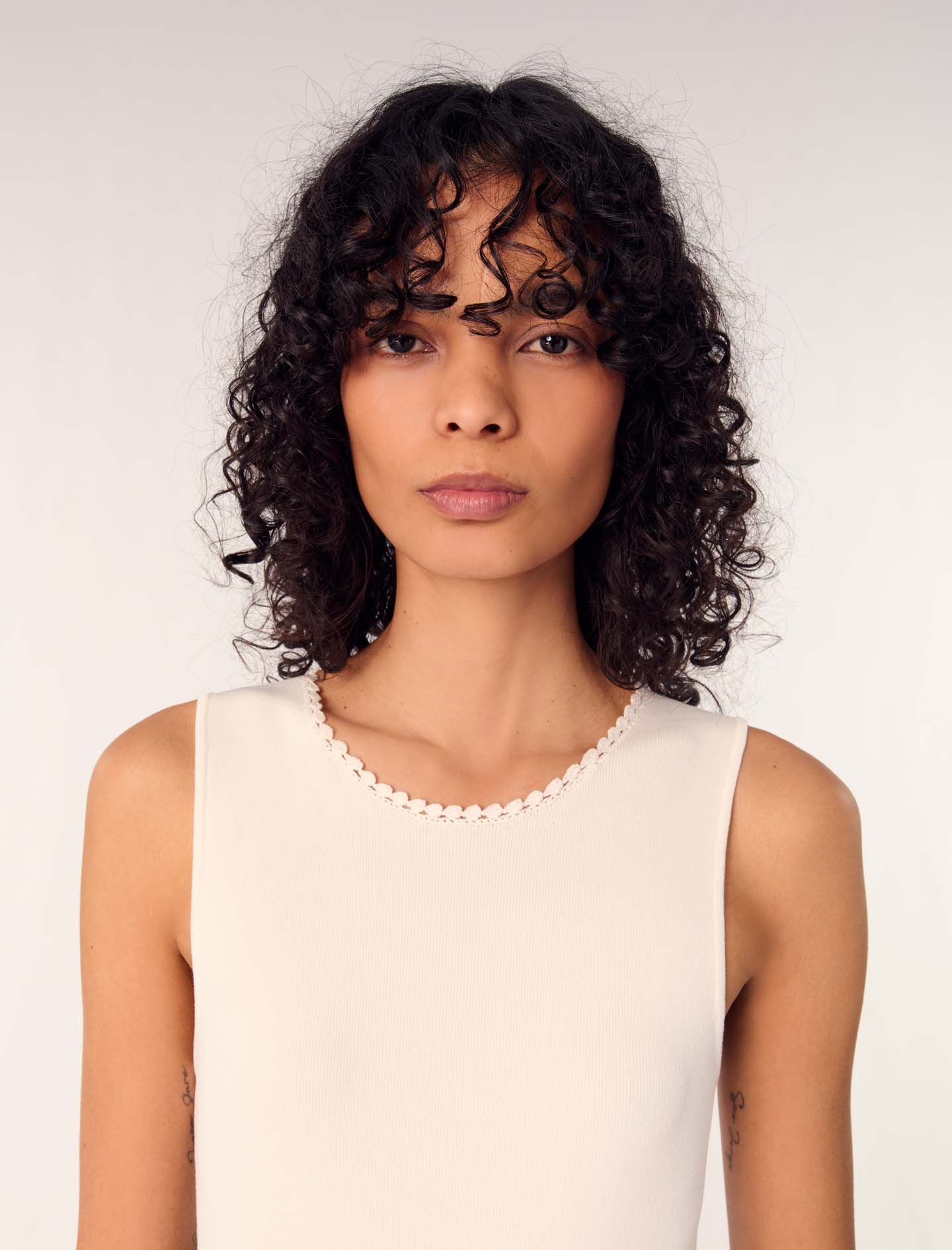 Áo bodysuit phối viền cut out lưng