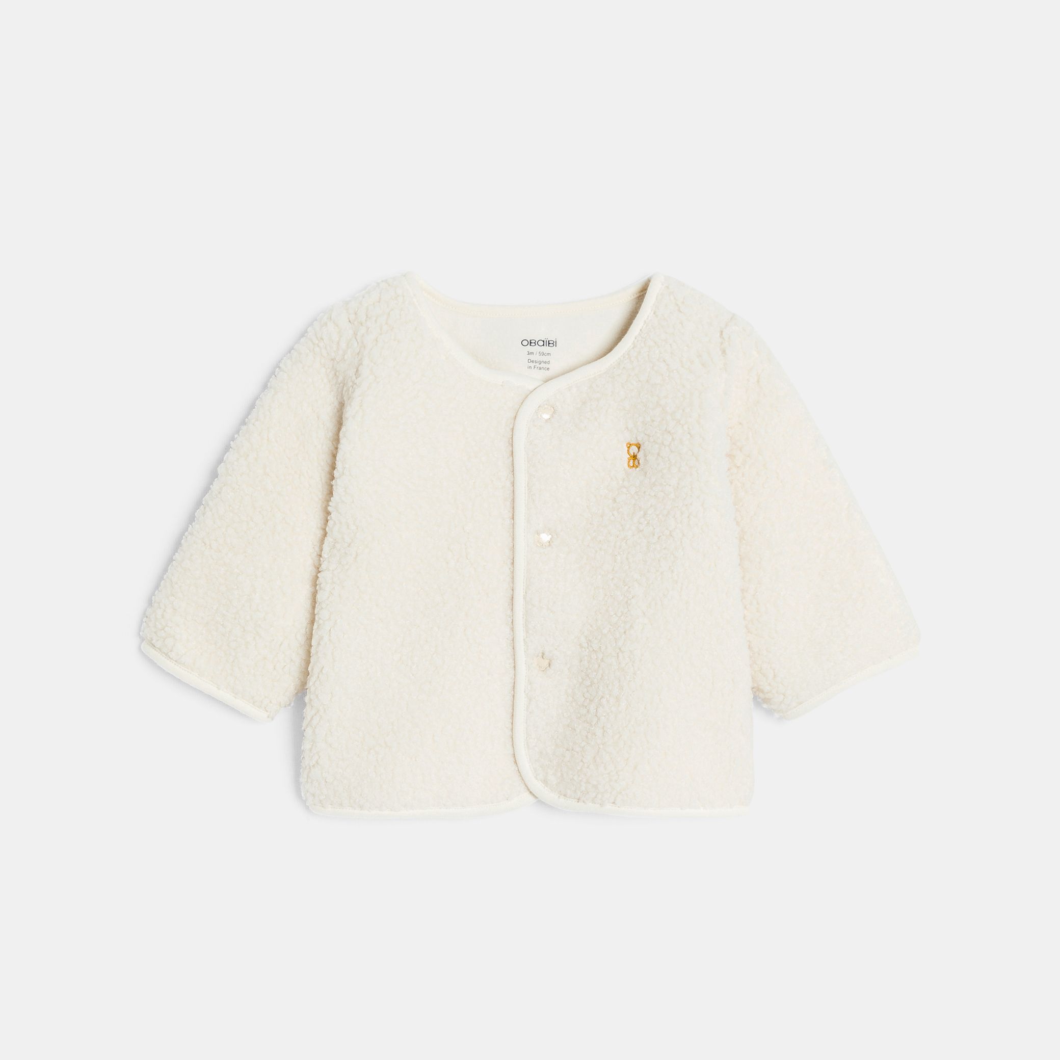 Bộ cardigan lông, quần nhung tăm và bodysuit vàng