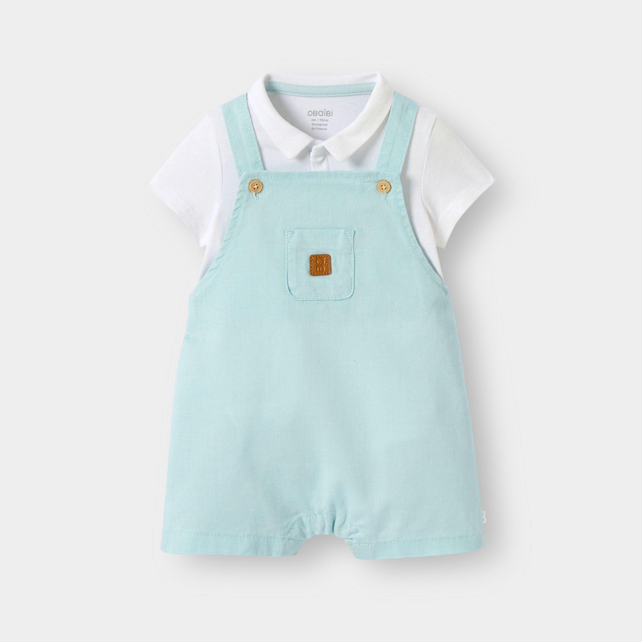 Bộ quần yếm ngắn màu xanh và bodysuit cho bé