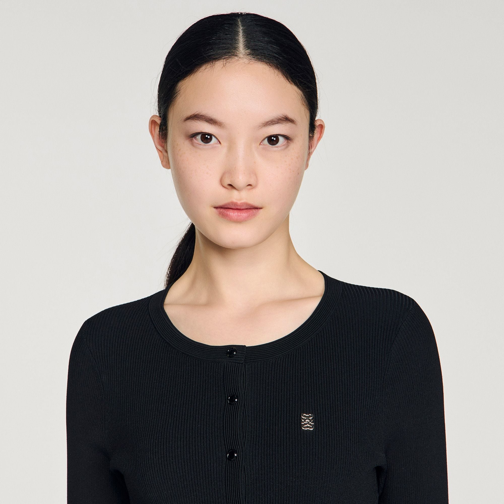 Váy ngắn dệt kim xếp ly