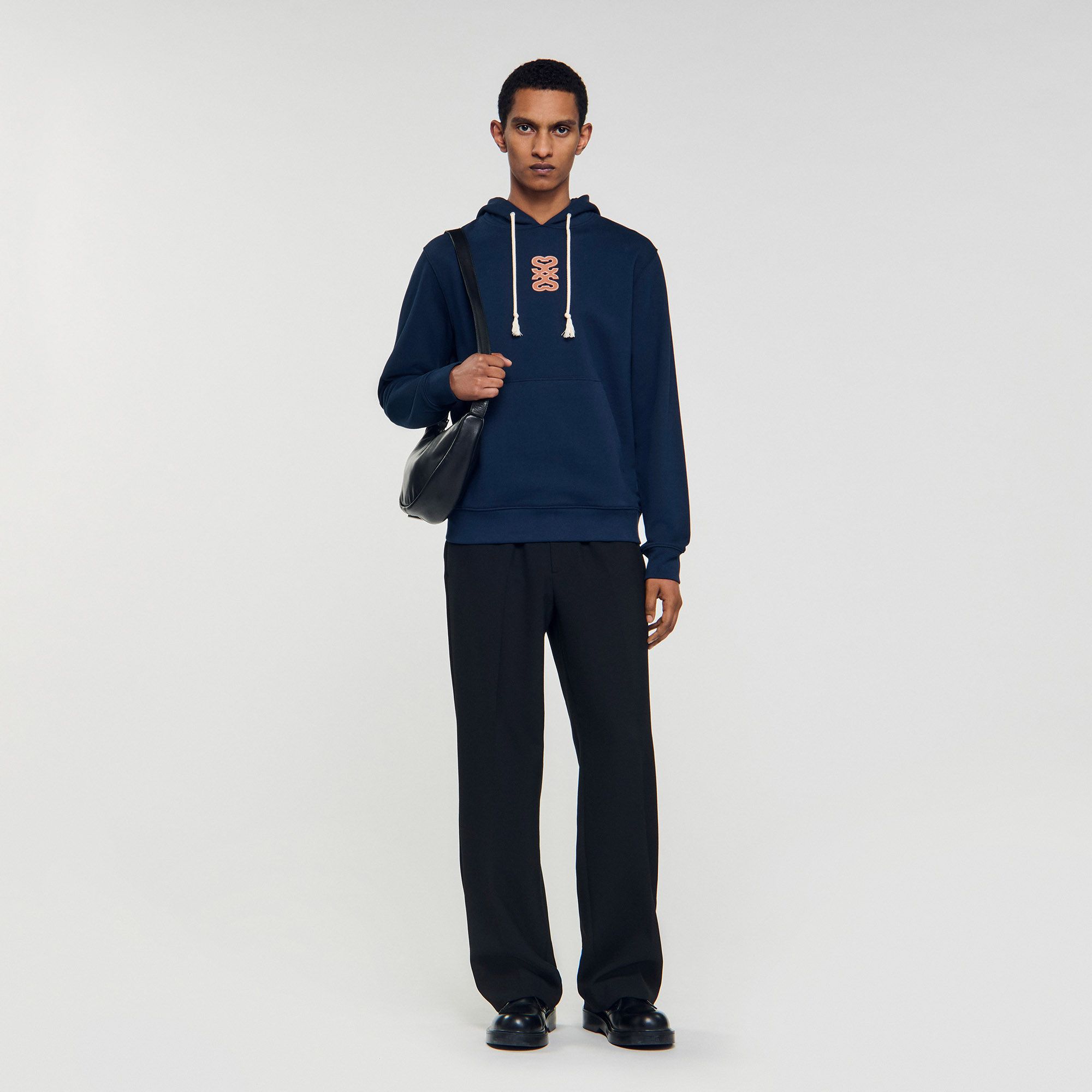 Sandro - Áo hoodie phối logo da
