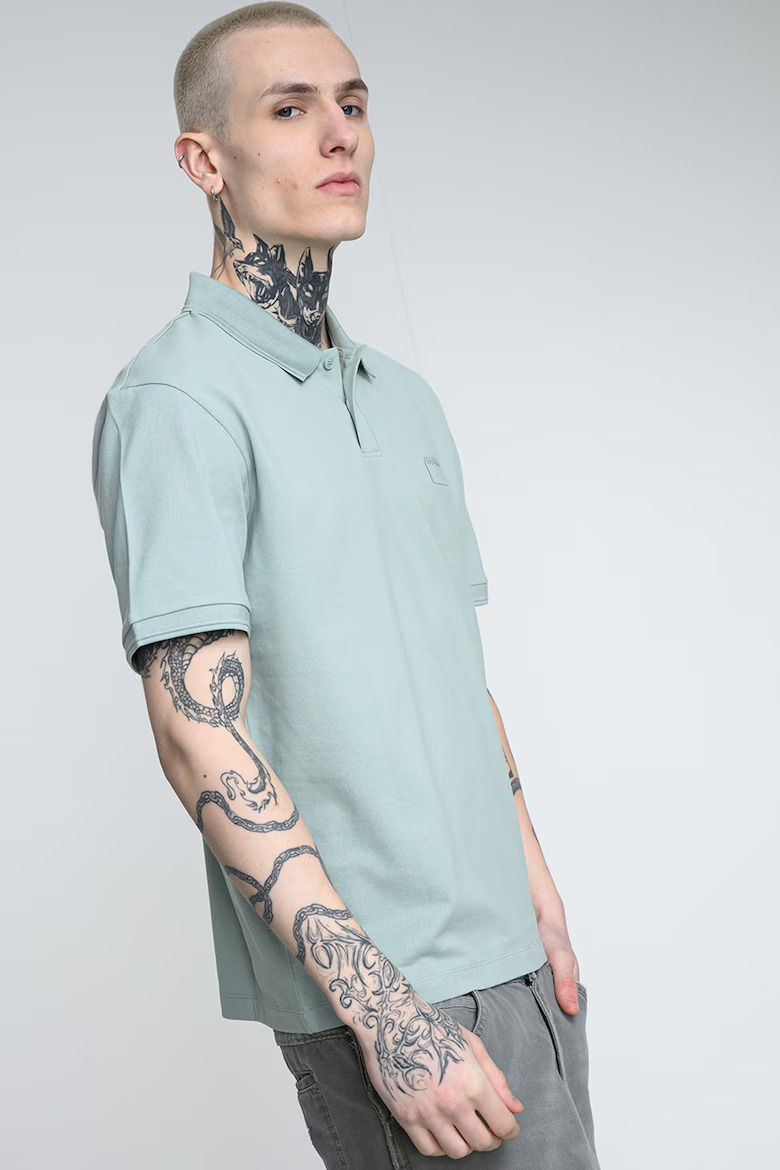 HUGO - Áo polo dáng relaxed-fit vải cotton piqué in logo cắt đôi