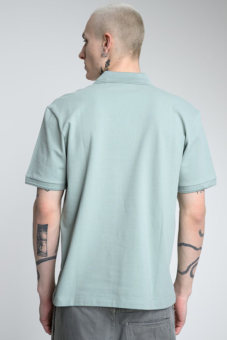 HUGO - Áo polo dáng relaxed-fit vải cotton piqué in logo cắt đôi